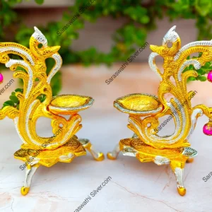 Gold plated peacock diya Decorative pooja deepam set Big size diya for home temple Traditional hanging diya with peacock Indian festival diya decor Brass look gold diya set Pooja room accessories online South Indian diya pair for gift Hanging diya for temple decoration