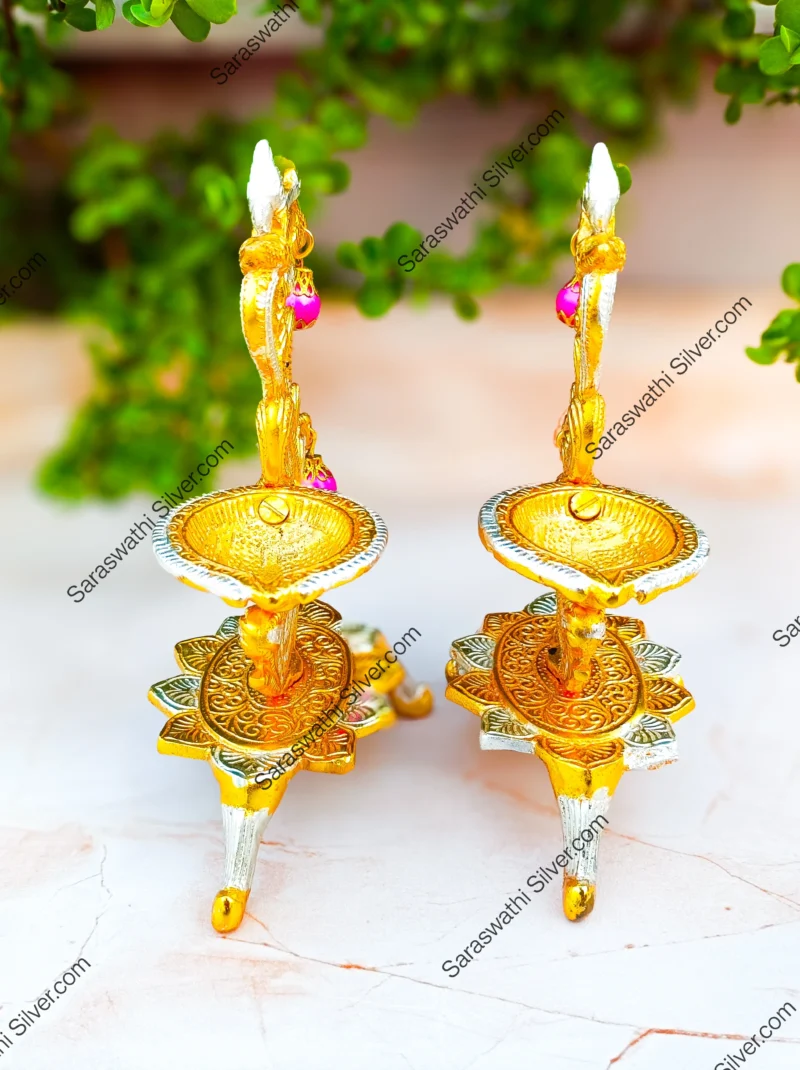 Gold plated peacock diya Decorative pooja deepam set Big size diya for home temple Traditional hanging diya with peacock Indian festival diya decor Brass look gold diya set Pooja room accessories online South Indian diya pair for gift Hanging diya for temple decoration