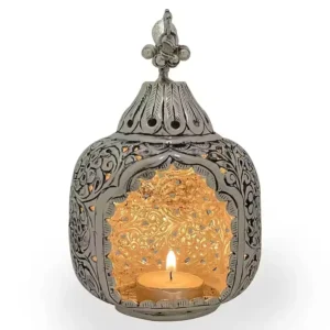 Antique diya holder Metal tealight candle stand Decorative pooja lantern Vastu diya for home Diwali gift item Spiritual tealight lamp Handcrafted temple diya Silver oxidized tealight décor German silver lantern Candle holder for positive energy